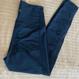Spiritual Gangster Active High Waist Tight color is a dark blue